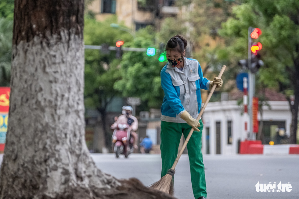 đồng phục bảo hộ cho công nhân vệ sinh đường phố